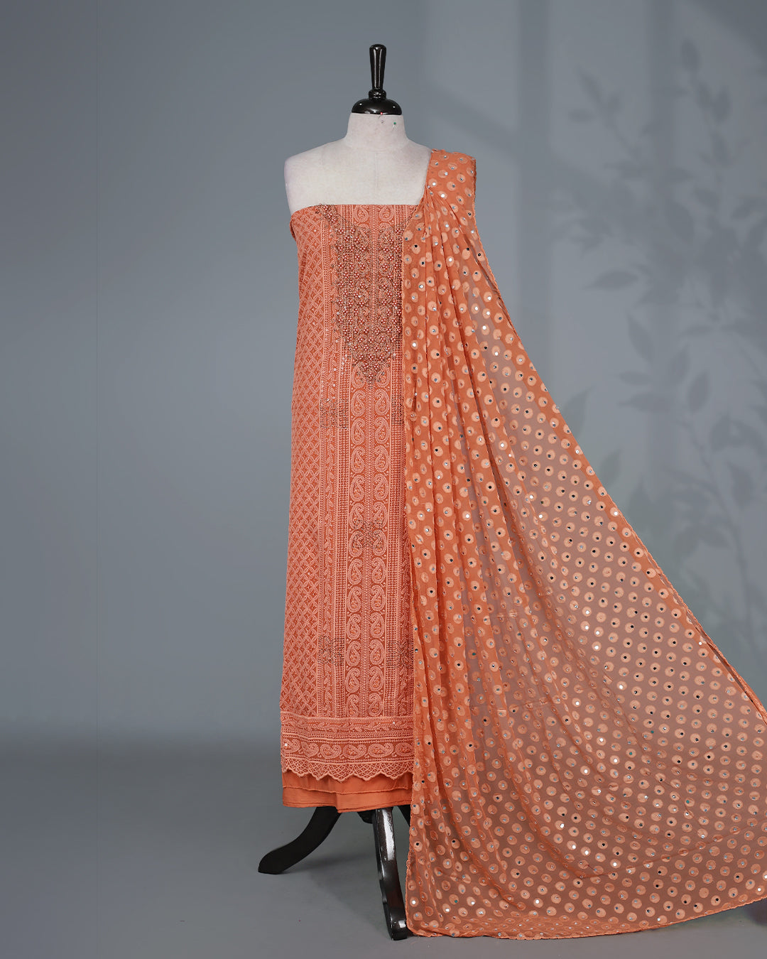 Coral Colour  Georgette Salwar Material featuring elegant Chikankari Work on the kurta, paired with a matching bottom and a stunning sequin-embellished dupatta for a graceful festive look.
