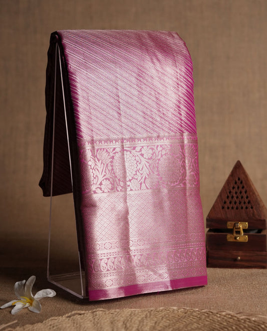 Magenta colour and gold zari Tissue Brocade Saree features intricate line Motifs on body and a traditional border & pallu, paired with matching blouse