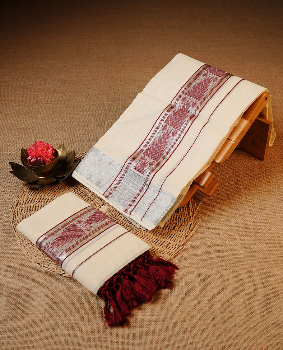 Off white colour Cotton Set Mund featuring a plain body, enhanced by a maroon traditional woven border with geometric motifs.