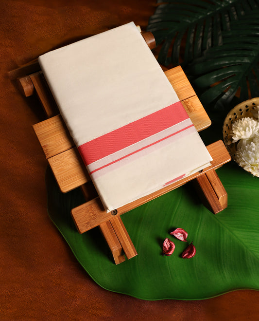 Off white cotton single dhoti featuring a peach kara with fine double line edging, crafted for timeless traditional charm and daily comfort, ideal for rituals, festivals, and cultural occasions.