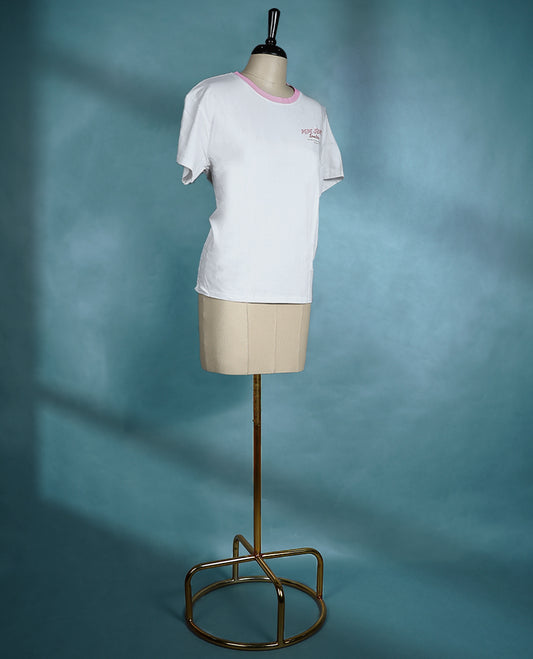 White T shirt with a pink crew neckline, short sleeves, and a front chest print for a casual look.