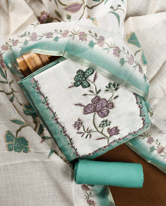 Beige & Sea green colour churidhar material with floral print enhanced by sewn glass beads on the body, paired with plain lavender bottom & floral print dupatta.
