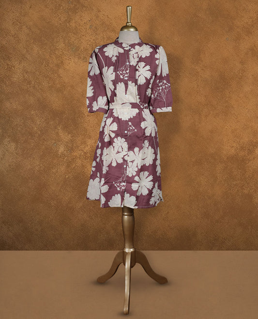 Wine maroon floral printed knee-length shirt dress with band collar, pintuck-detailed yoke, matching waist belt, and half sleeves.