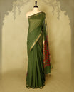 Grass Green colour chanderi cotton saree with fine striped body, mangalgiri border, grand pallu featuring Red and gold zari stripes, with matching blouse.