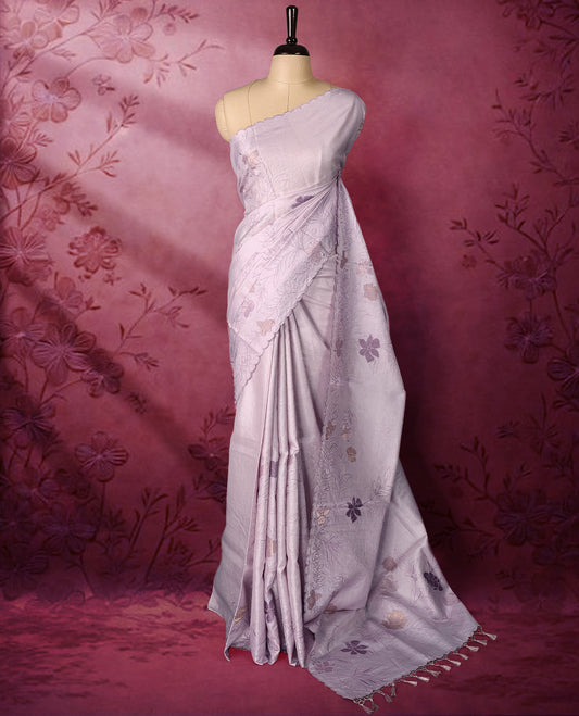 Pastel purple colour pure tussar silk lightweight saree with self colour floral kodi embroidery and tissue fabric applique work on the body, scallop embroidery worked border, with matching self colour plain blouse