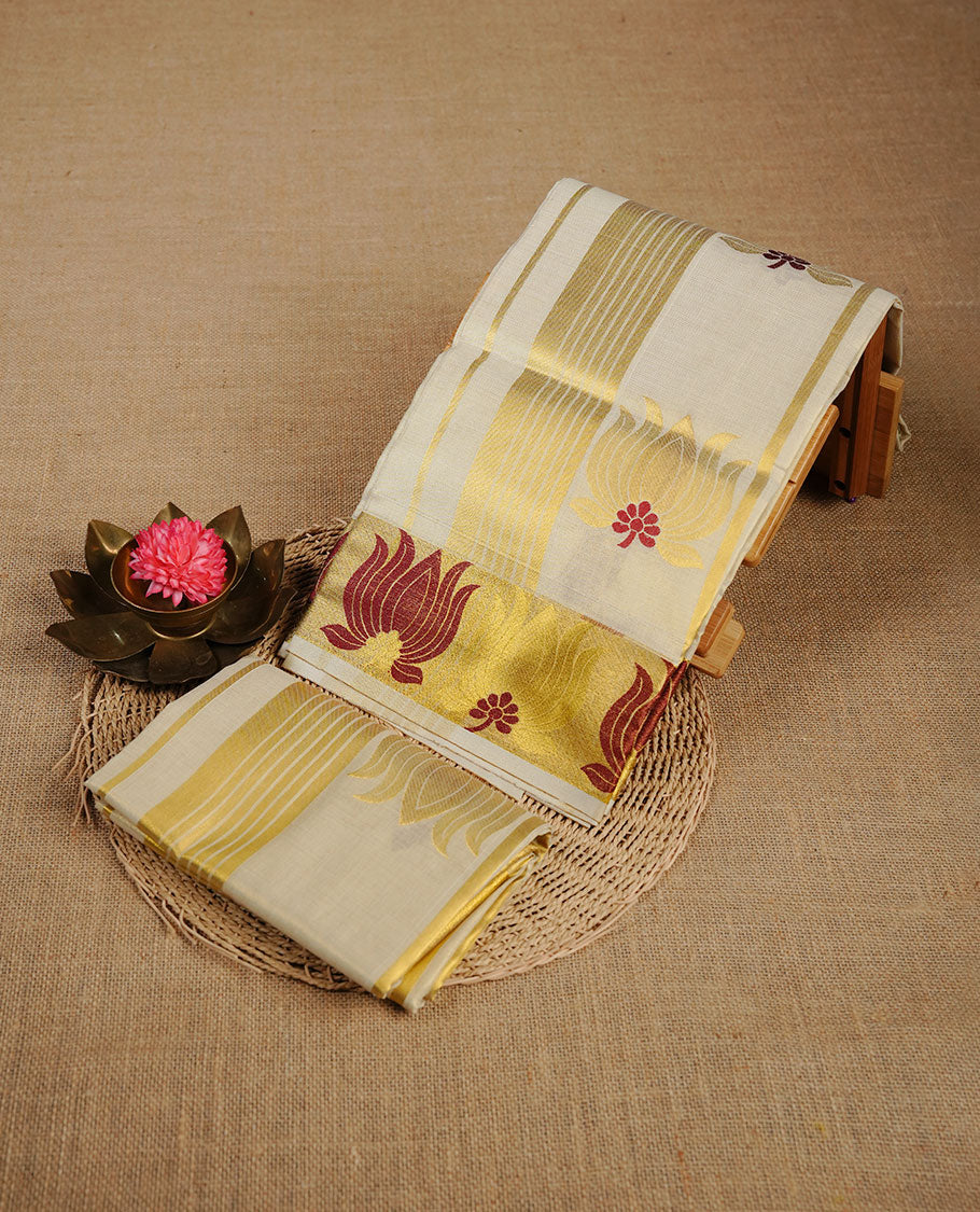 Light gold colour tissue set mundu highlighting gold zari stripes & lotus on body, border.