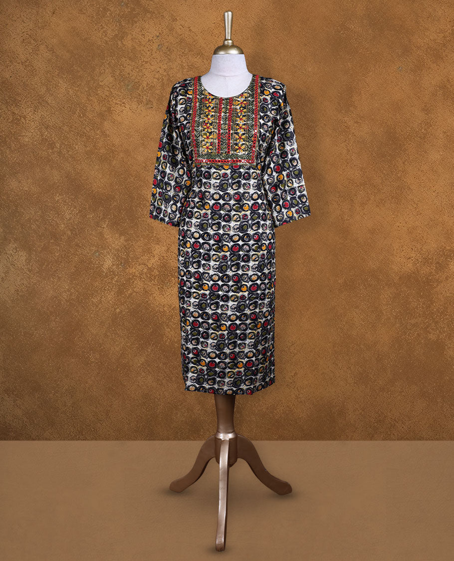Black colour kurti decked with multicolour circular prints all over, featuring a heavily embroidered yoke with mirror accents, a scoop neckline and comfy 3/4th sleeves.