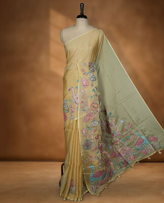 Pastel yellow colour organza saree with multicolour thread embroidery on the pallu and fine border detailing, paired with a matching blouse.