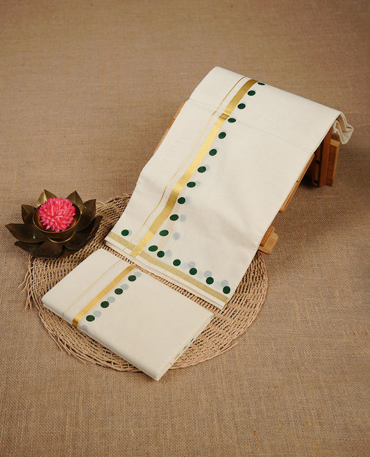 Cream colour cotton set mundu highlighting gold zari border with green colour circle print.