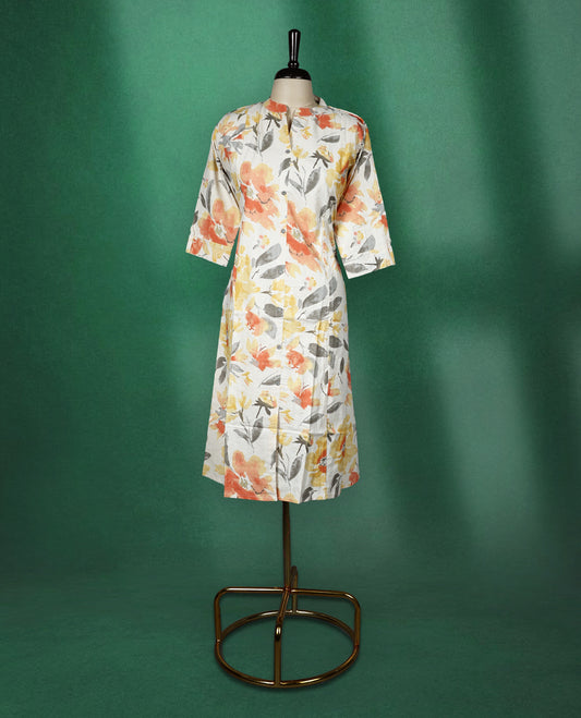 Off White colour kurti highlighted with vibrant orange, yellow, and grey floral prints, featuring a round neckline with a front slit and elbow length sleeves, cheerful and breezy pick for daytime wear.
