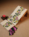 Cream colour Tissue silk set mund Featuring Elegant plain body, Complemented by Floral kodi print on border.