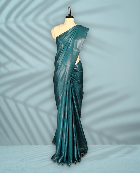 Deep Aqua Colour semi silk saree featuring an intricate Zari  motif weave across the body, paired with a zari worked border with matching blouse.