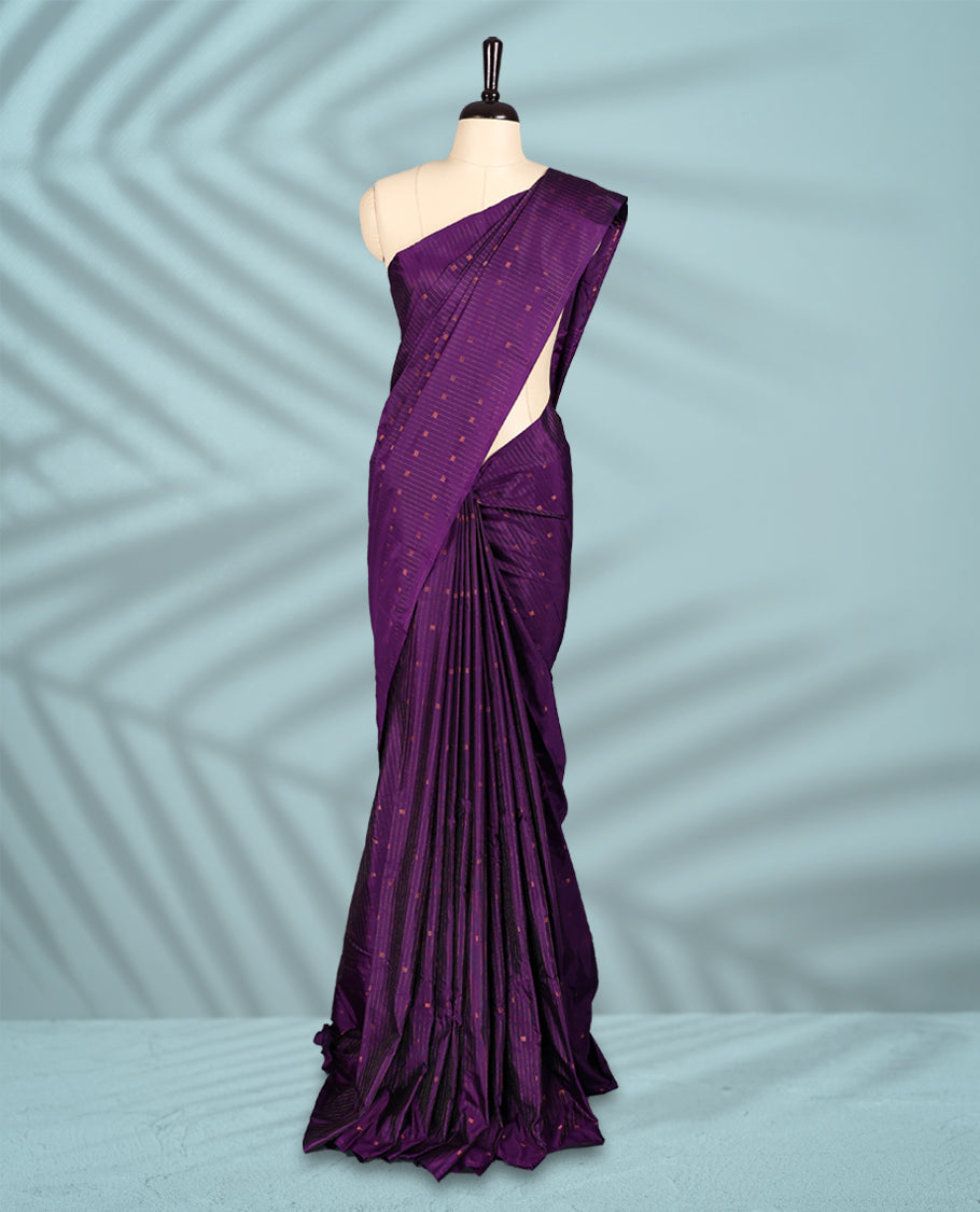 Deep violet colour semi silk saree with fine copper zari stripes and dotted motifs across the body, without have a border, Comes with a matching blouse.