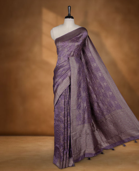 Dark Lavender colour Banarasi Bandhani silk saree featuring with intricate Banarasi motifs on body, complemented by antique zari woven border and grand pallu, paired with matching  blouse