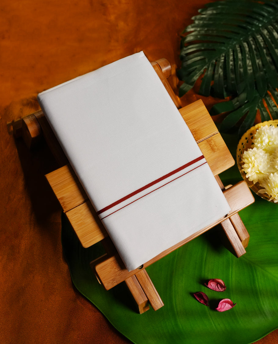 White colour cotton dhoti with a minimal maroon border, Soft, breathable, and ideal for everyday traditional wear or spiritual occasions & A subtle and elegant staple for your ethnic wardrobe.