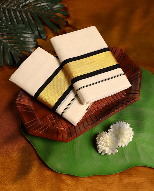 Off white colour cotton SET MUNDU featuring a plain body, complemented by a Black and gold toned 3 inch border ( 2.00/2.80 MTS ).