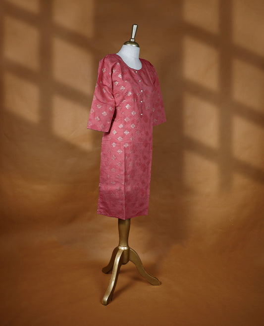 Dusty red colour kurti from TWARA, featuring intricate golden foil print in a geometric floral pattern, finished with a round neckline and a button-down front placket.