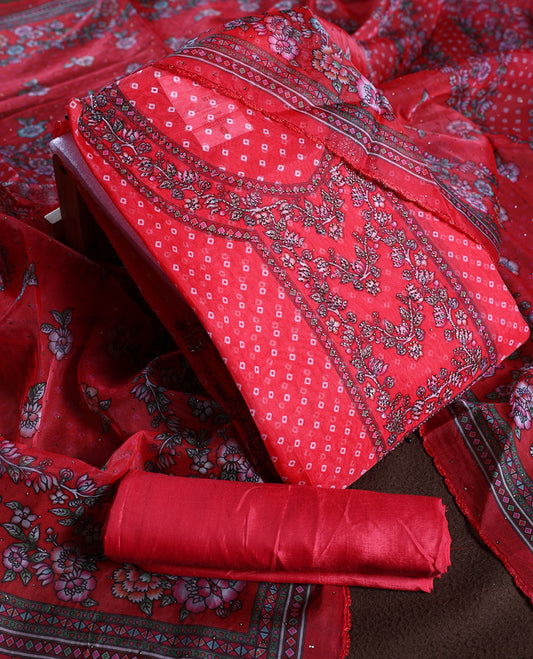 Rose red colour churidhar material adorned with delicate floral, stone and vine prints, enhanced by a contrast border & Paired with a plain matching bottom, perfect for festive wear and casual elegance.