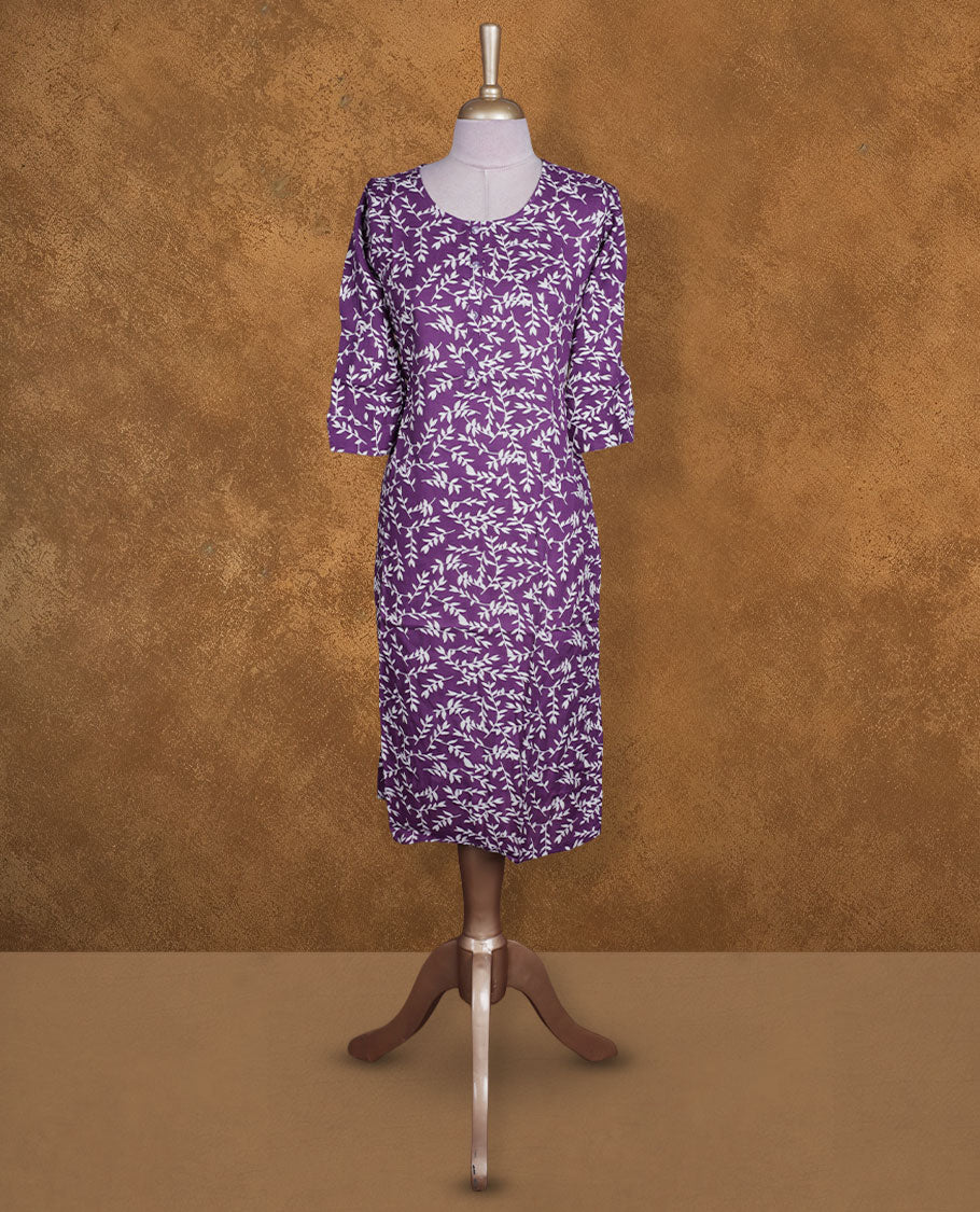 Violet and white colour kurti with White leaf kodi prints, knee length design, styled with a round neckline and a sleeve .