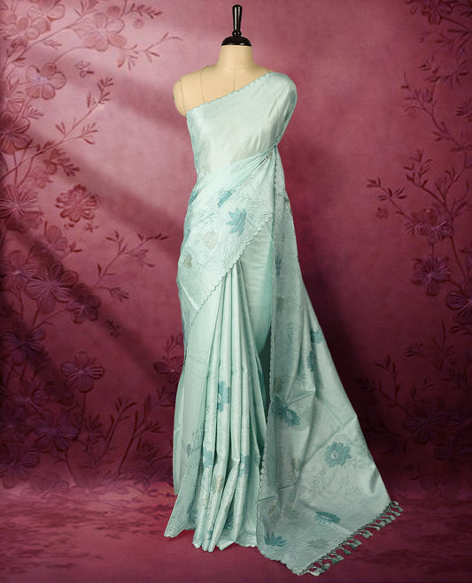 Pastel aqua colour pure tussar silk lightweight saree with self colour floral kodi embroidery and tissue fabric applique work on the body, scallop embroidery worked border, with matching self colour plain blouse