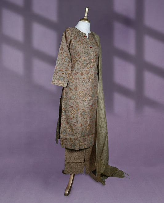 Earthy toned kurti set features a round split neckline with button detailing and straight three quarter sleeves, paired with printed pants and a complementing dupatta.