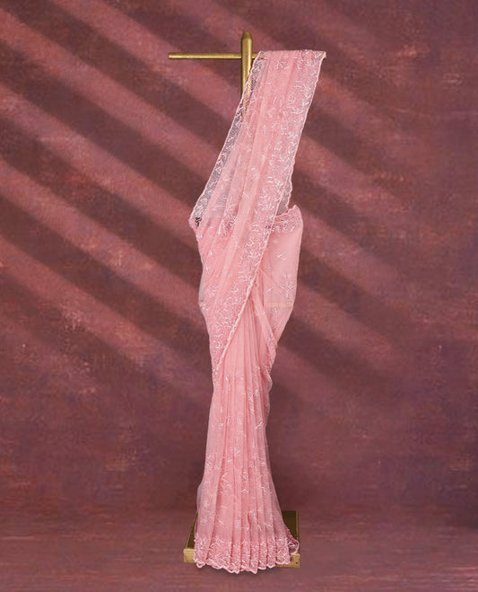 Light Pink colour net designer saree featuring beads and sequin floral kodi detailing on the body, adorned with beads and sequin worked floral kodi scallop border, paired with a matching worked blouse