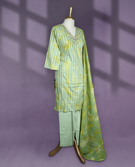 Pastel green colour salwar set with V neck and elbow sleeves featuring floral embroidery on neckline and yellow leaf prints on body paired with matching plain bottom and green floral printed dupatta