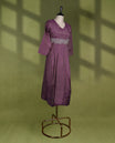 Elegant pastel plum coloured kurti with a V neckline and delicate silver embroidery around the waist and scattered across the bodice and sleeves.