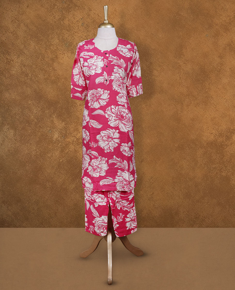 Pink colour coord set adorned with all over off white colour floral prints, featuring a straight cut kurta with round neckline and 3/4th sleeves, paired with matching bottoms.