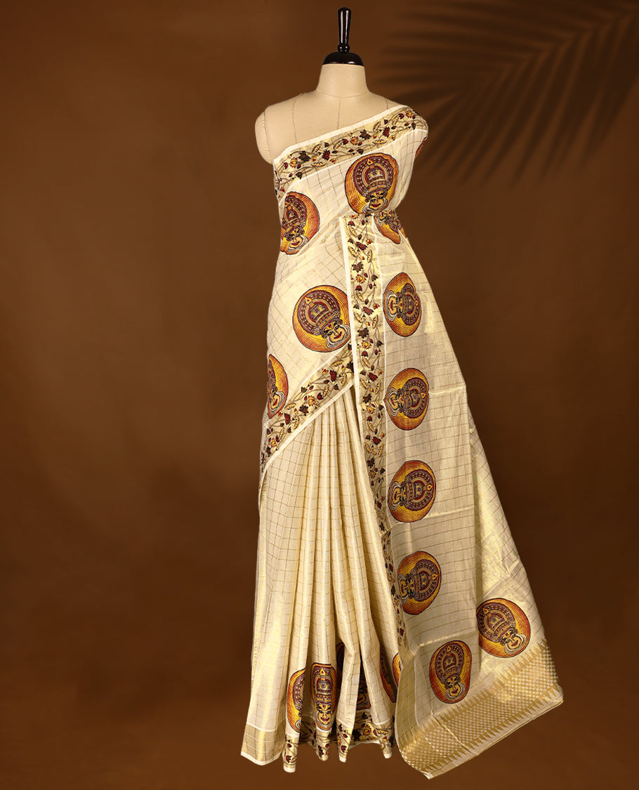 Light Gold colour Tissue Kerala saree featuring Kathakali motifs on the body, golden zari checks, and a beautifully woven border with Floral Printed motifs, paired with a matching blouse perfect for festive occasions.