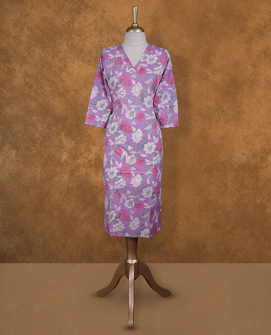Light purple colour kurti enlivened with white and fuchsia floral blooms, styled with a graceful V-neckline and easy 3/4th sleeves.