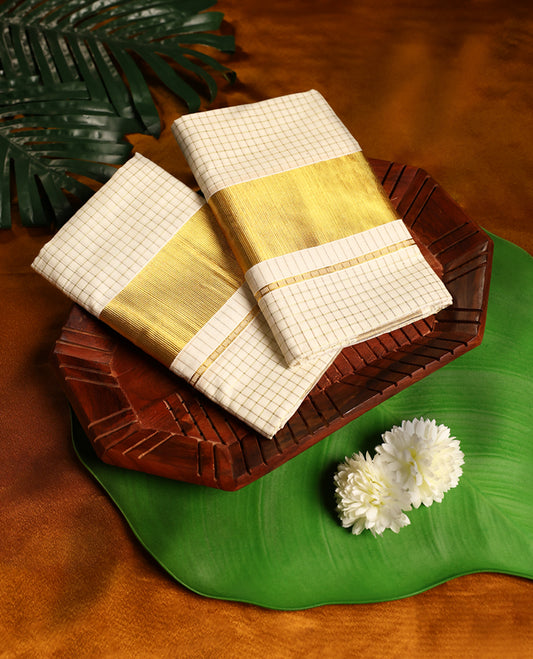 Off white colour cotton SET MUNDU featuring Gold Zari small checked body, complemented by a Bold Gold Zari border(2.00/2.80 MTS)