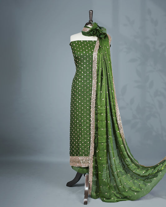Green colour salwar material with Cut beats & sequins work on body, Matching Bottom & dupatta.