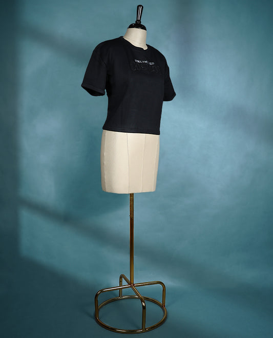 Black short sleeve T shirt featuring a round neck and a relaxed fit, crafted from soft fabric for a casual style.