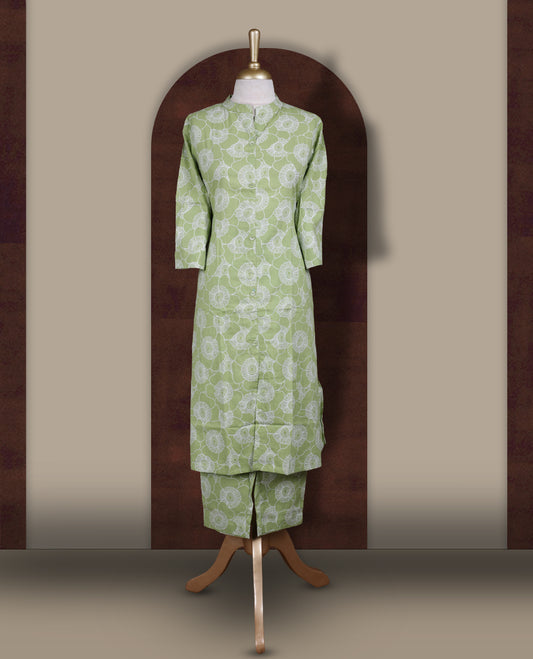 Pista green colour coord set featuring white floral prints all over, mandarin collar, front buttons and sheer 3/4 sleeves, Paired with matching pants, it offers a sleek, modern look perfect for refined casual wear.