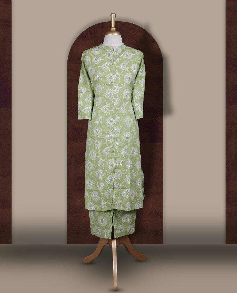 Pista green colour coord set featuring white floral prints all over, mandarin collar, front buttons and sheer 3/4 sleeves, Paired with matching pants, it offers a sleek, modern look perfect for refined casual wear.