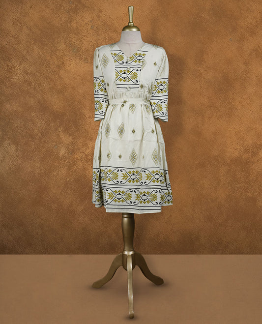 Ivory printed knee-length A-line dress with V-neckline, olive and black ethnic motifs, three-quarter sleeves, and a detachable waist belt for a cinched fit.