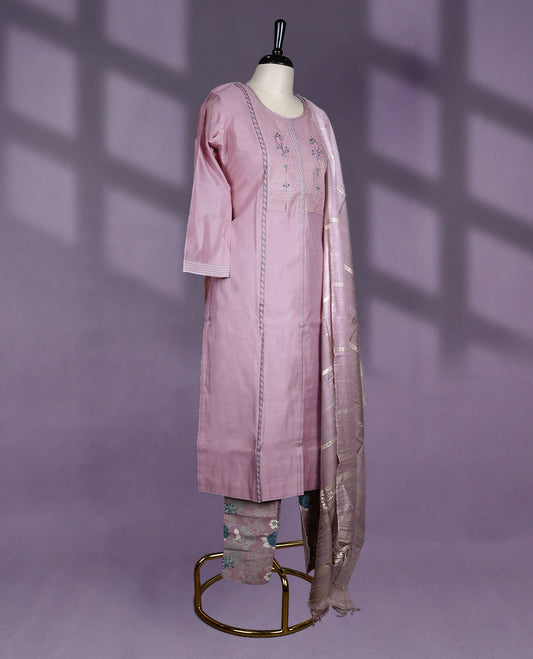 Elegant mauve colour kurti set featuring a round neckline, subtle floral embroidery on the yoke, and delicate stitch detailing, Paired with floral printed pants and a shimmering dupatta with soft golden zari stripes for a refined finish.
