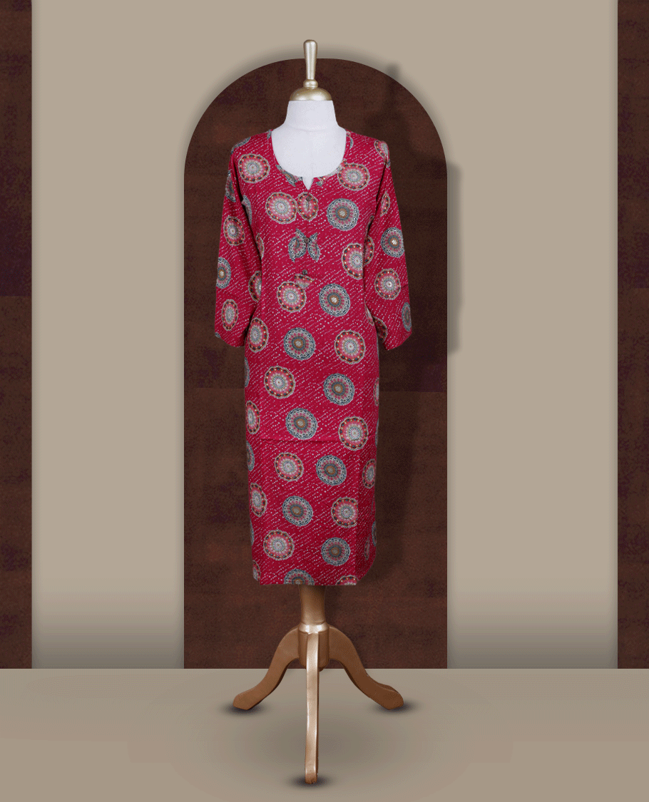 Magenta colour straight cut kurthi featuring elegant circular ethnic prints, styled with a round V notch neckline and comfortable 3/4th sleeves.