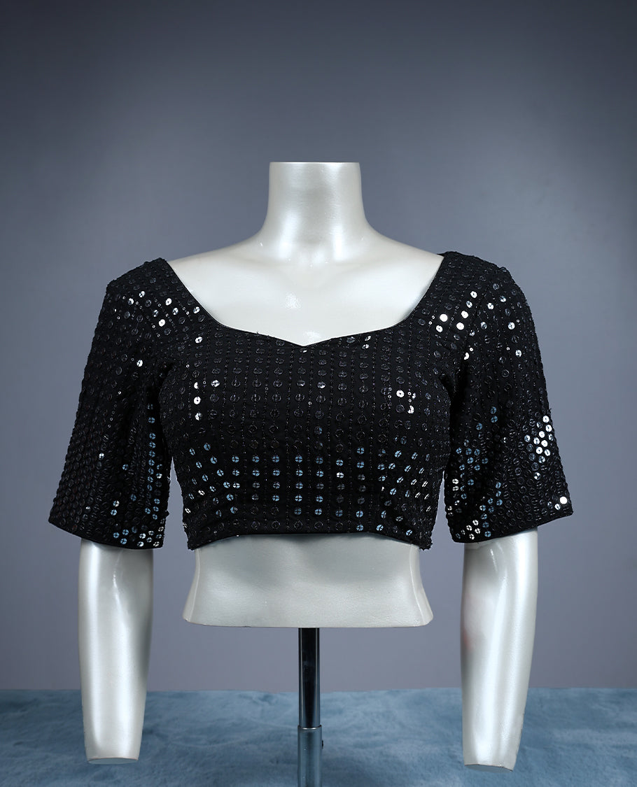 Black, sweetheart neckline and elbow length sleeves, fully embellished with shimmering circular sequins work, padded and ready to wear Blouse