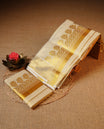 Cream colour Tissue silk set mund Featuring Elegant plain body, Complemented by Gold zari design with zari border.