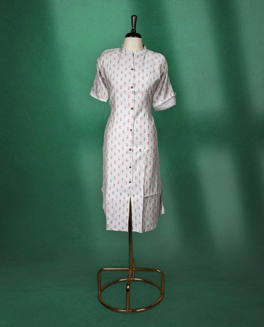 Beige colour cotton kurti with subtle red and grey all-over prints, featuring a mandarin collar, front button placket, and short roll up sleeves, comfortable and stylish choice for everyday wear
