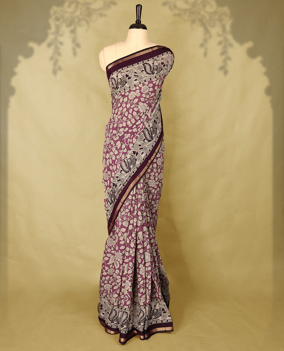 Light Purple colour chanderi cotton saree with white floral Kodi printed body, dark purple border with peacock and floral motifs, grand pallu featuring large peacock designs, with matching blouse