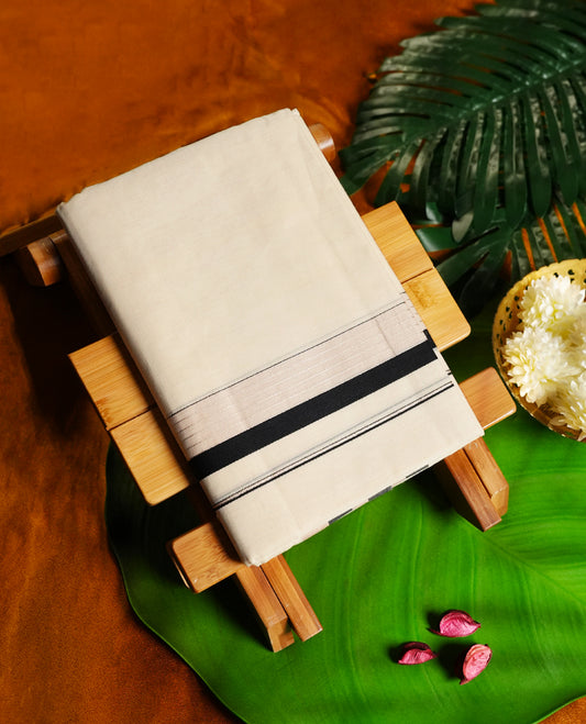 Beige colour cotton single dhoti featuring a bold black kara with elegant beige detailing & Designed for daily comfort and traditional grace, ideal for rituals, cultural events, and festive wear.