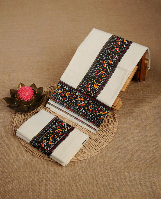 Cream colour cotton set mundu highlighting Black colour floral & birds motifs printed border.