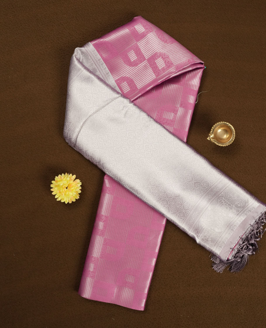 Magenta Pink colour Semi Silk Saree with Self-Checked Geometric Patterns on the Body, Contrasting Silver Zari Woven Pallu and Border Featuring Intricate Motifs and Tassels, Paired with Coordinated Blouse Piece