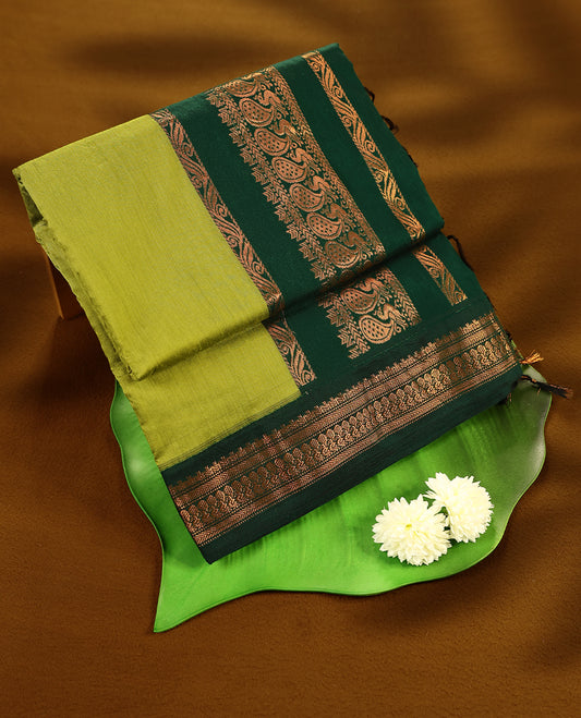Lemon Green colour mixed Kalyani cotton saree featuring Plain body, paired with Bottle Green colour traditional border and pallu, with matching blouse