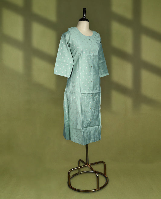 Pista green colour straightcut kurti crafted in soft fabric featuring subtle butta work all over, designed with a round neckline, front button placket and 3/4th sleeves.