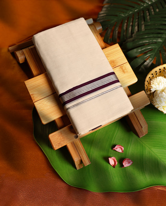 Elegant off white colour handloom pure cotton double dhoti adorned with a rich grape border highlighted by silver stripe detailing, offering a refined and traditional appeal.