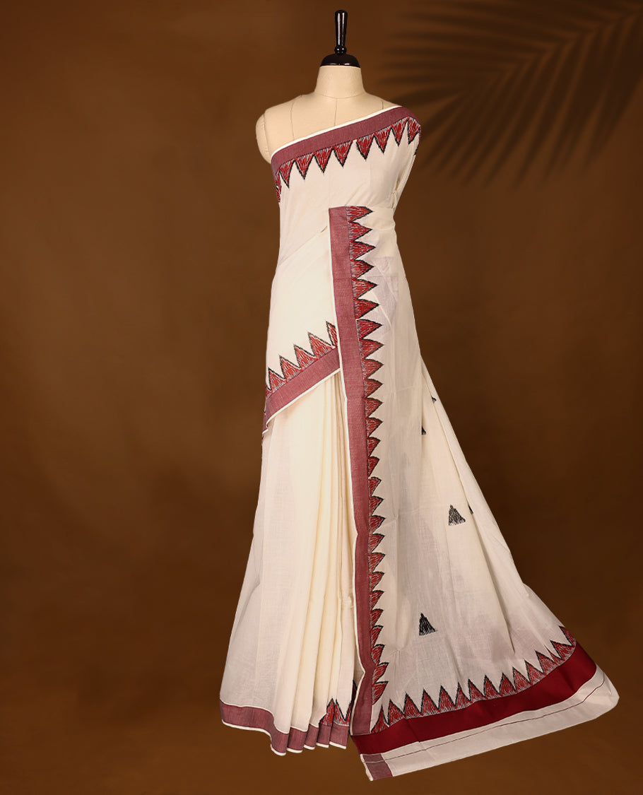 Elegant off white colour cotton Kerala saree featuring Plain body, deep Maroon colour border with temple designs, Paired with matching blouse offering a classic and graceful look, paired with a matching blouse.